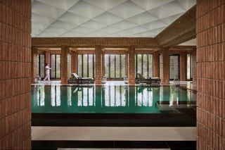 A Moroccan luxury spa features terracotta and seagreen color decor.