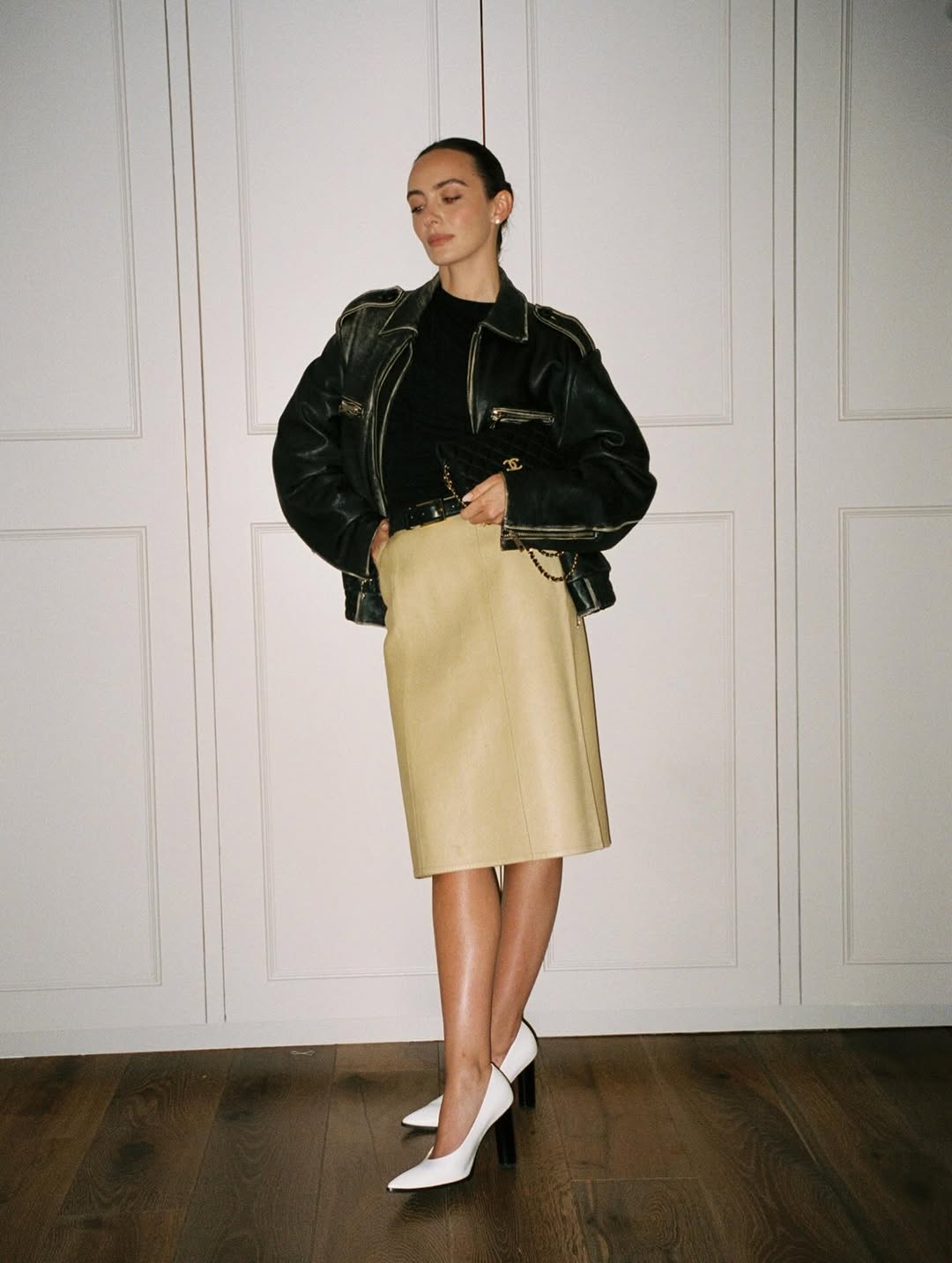 Woman wearing layering outfit idea 2026.