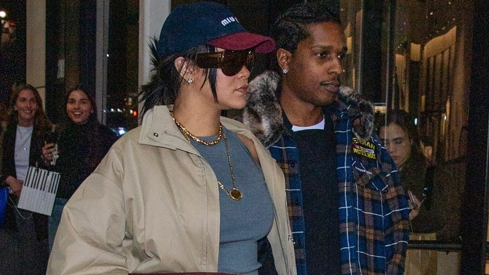 Rihanna wore the naked sandals trend with a Dior bag and camel coat