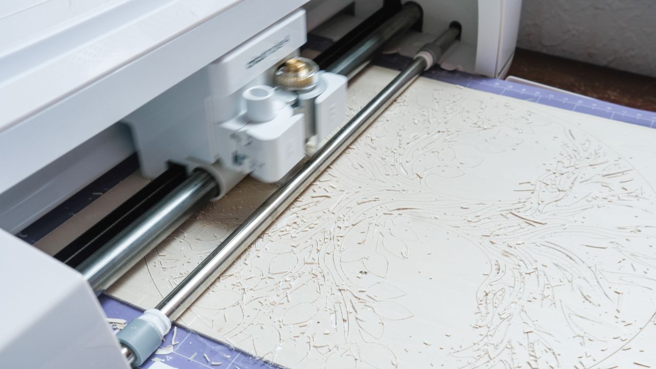 Cricut Maker 4 cutting machine making projects with basswood and cardstock