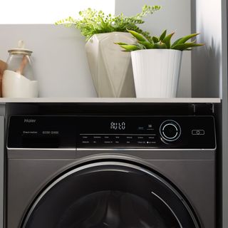 Front panel of black and grey washing machine