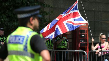 woman waving british flag