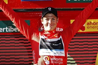 Jakob Fuglsang donned the red leader's jersey