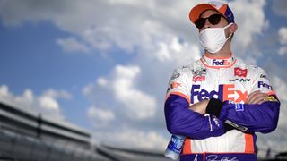 Denny Hamlin waits on the grid before the NASCAR Cup Series Drydene 311 at Dover International Speedway on August 23, 2020. He'll look to keep his winning streak alive this weekend.