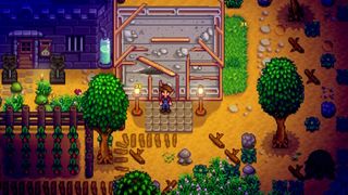 Stardew Valley screenshot - farmer standing in the yard in front of his house