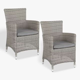 Two rattan-effect garden chairs