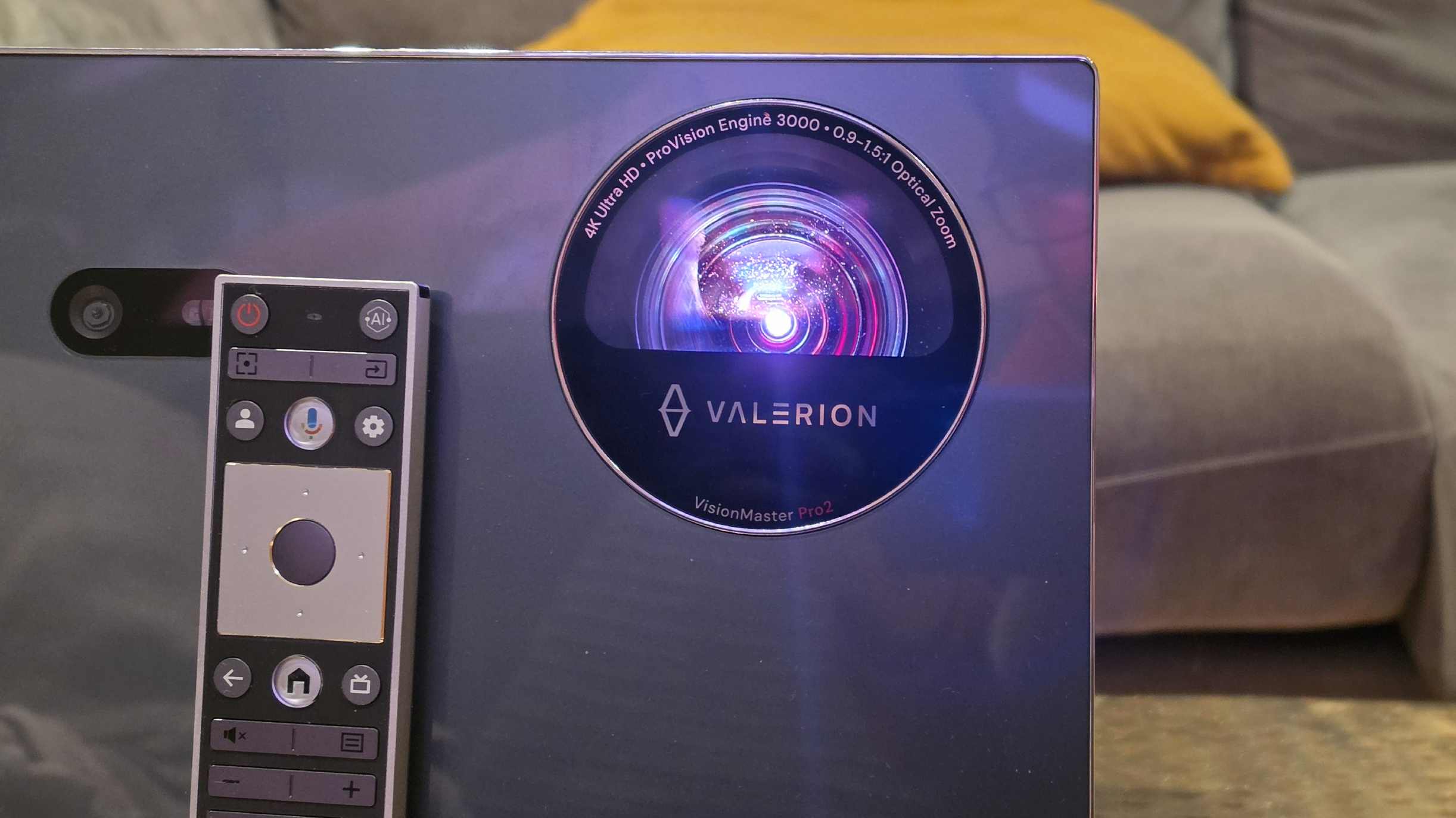 The Valerion VisionMaster 2 Pro's lens, and the top of its remote.
