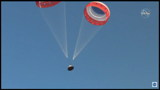 Two of the three main parachutes on board Boeing's Starliner capsule deployed successfully during the capsule's Nov. 4, 2019, pad abort test.