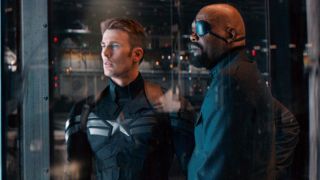 Captain America and Nick Fury take an elevator through SHIELD's HQ in The Winter Soldier movie