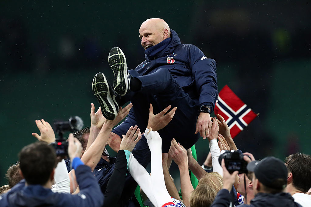 Stale Solbakken, Head Coach of Norway, is lifted into the air by players of Norway as they celebrate victory following the FIFA World Cup 2026 qualifier match between Italy and Norway at San Siro Stadium on November 16, 2025 in Milan, Italy.