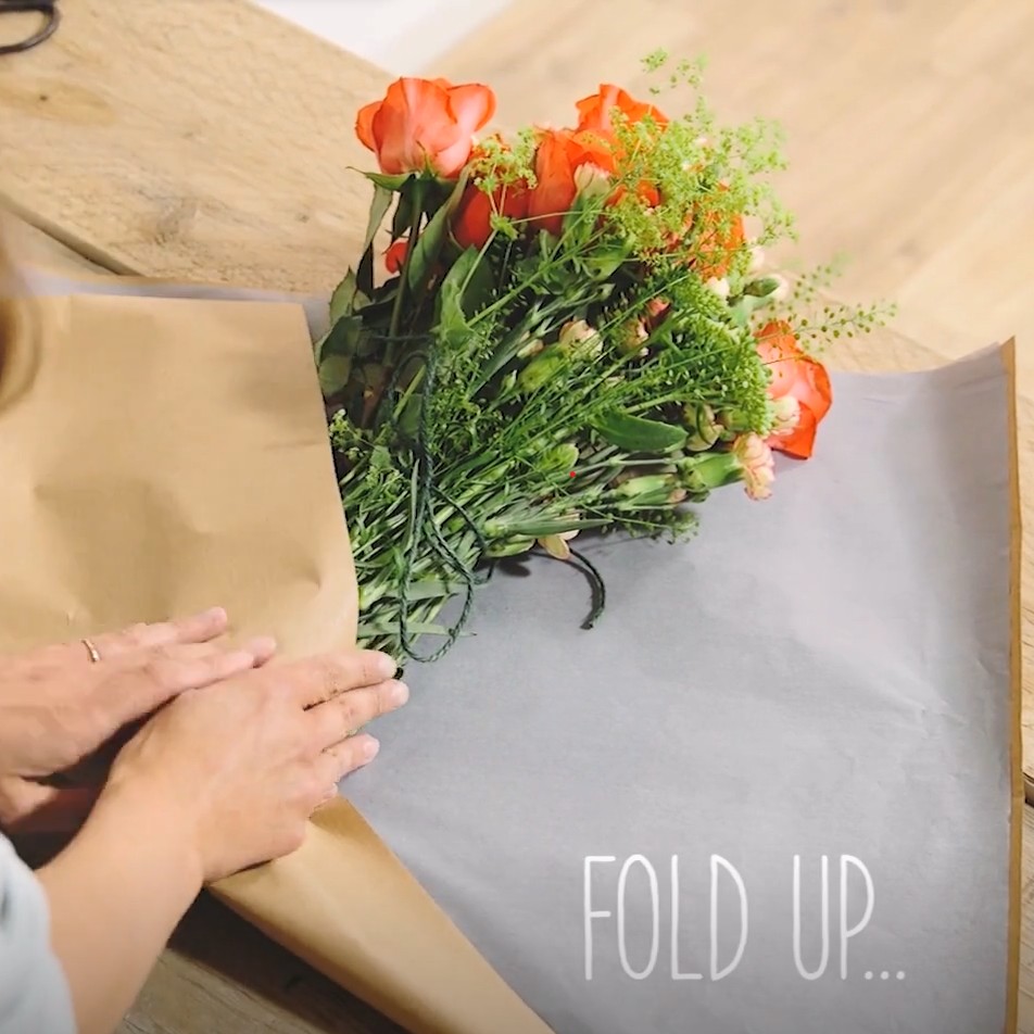 beautiful bouquets with flowers and brown paper
