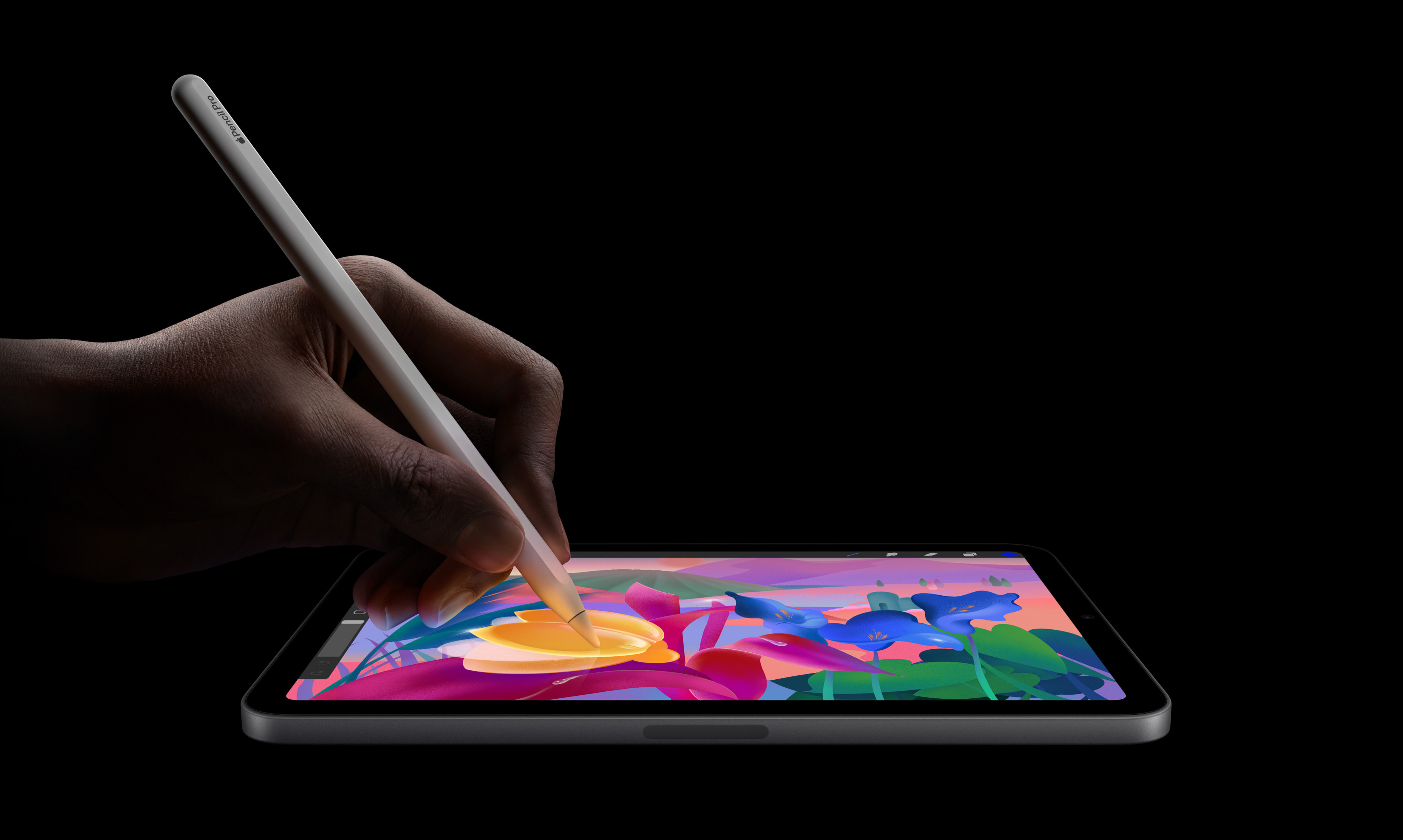 People using Apple Pencil Pro to write on iPad Mini 7