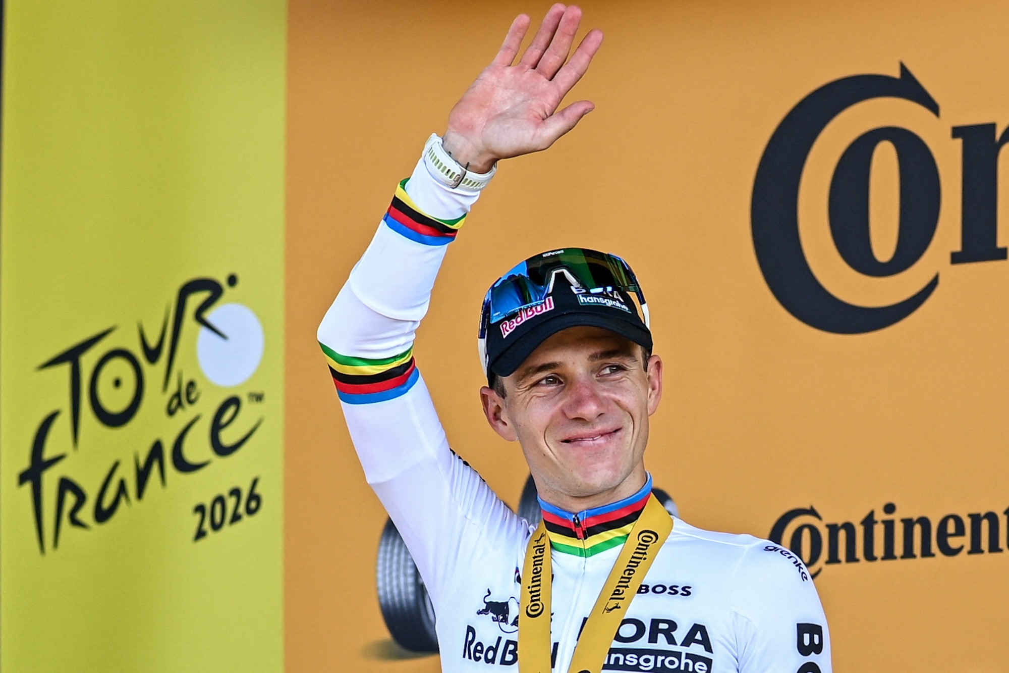 Belgian Remco Evenepoel of Red Bull-BORA-hansgrohe celebrates on the podium after winning the stage 16 of the 2026 Tour de France cycling race, an individual Time Trial stage of 26km from Evian-les-Bains to Thonon-les-Bains, on Tuesday 21 July 2026. The 113th edition of the Tour de France starts on Saturday 4 July in Barcelona, Spain, and will finish in Paris, France on the 26th of July. BELGA PHOTO DAVID PINTENS (Photo by DAVID PINTENS / BELGA MAG / Belga via AFP)