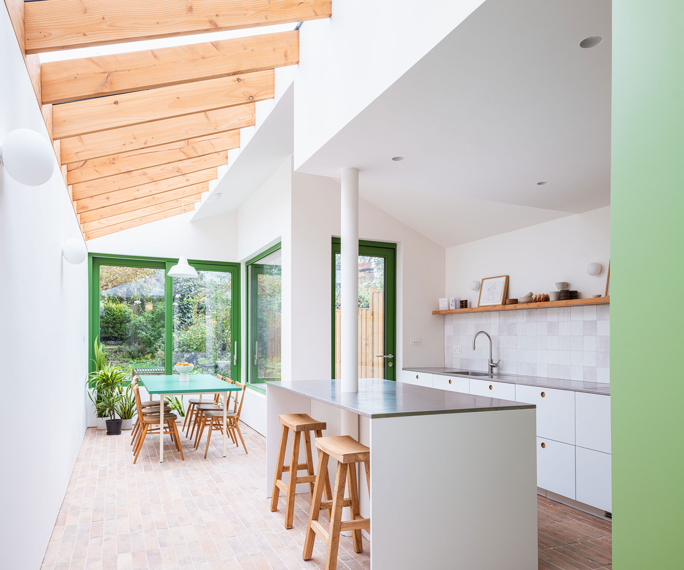 white kitchen with side return extension