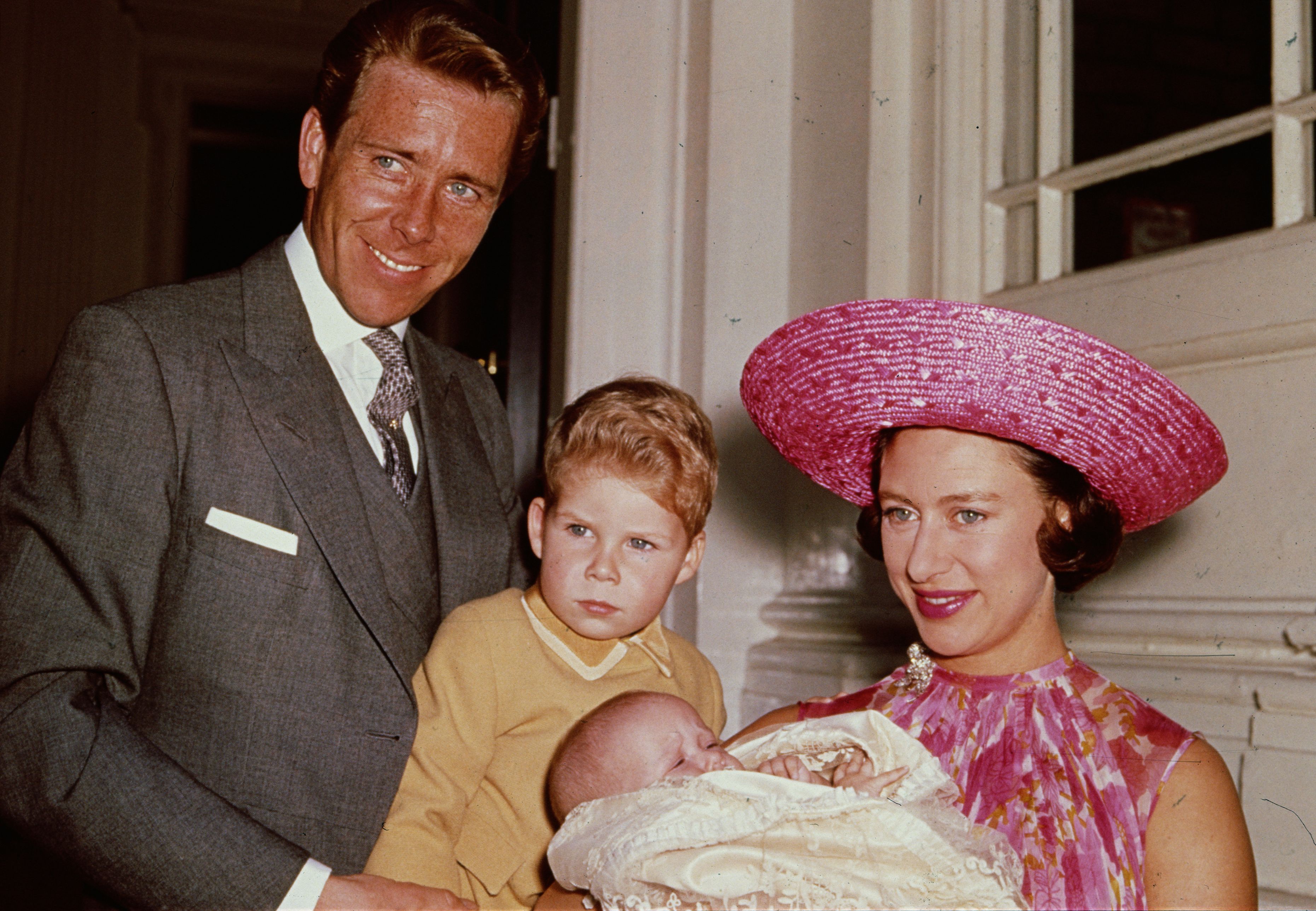 Princess Margaret with Lord Snowdon and Viscount Linley at Kensington Palace shortly after the birth of her daughter, Lady Sarah Armstrong-Jones. (Photo by Fox Photos/Getty Images)