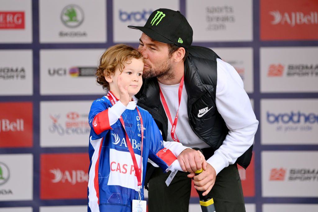 CLACTONONSEA ENGLAND OCTOBER 08 Mark Cavendish of United Kingdom and Team Deceuninck QuickStep accompanied by his son Frey David Cavendish on the podium ceremony after the 7th The Womens Tour 202 Stage 5 a 954km stage from Colchester to Clacton thewomenstour UCIWWT on October 08 2021 in ClactononSea England Photo by Justin SetterfieldGetty Images