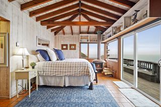 Kim Novak's house rustic bedroom with wood cladding