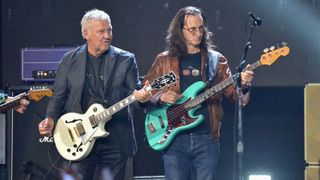  2013 Inductees Alex Lifeson and Geddy Lee of Rush perform onstage at the 32nd Annual Rock & Roll Hall Of Fame Induction Ceremony at Barclays Center on April 7, 2017 in New York City
