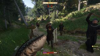 A fight against a group of bandits in Kingdom Come: Deliverance 2.