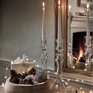 Christmas candle ideas with mirror and glass candlesticks