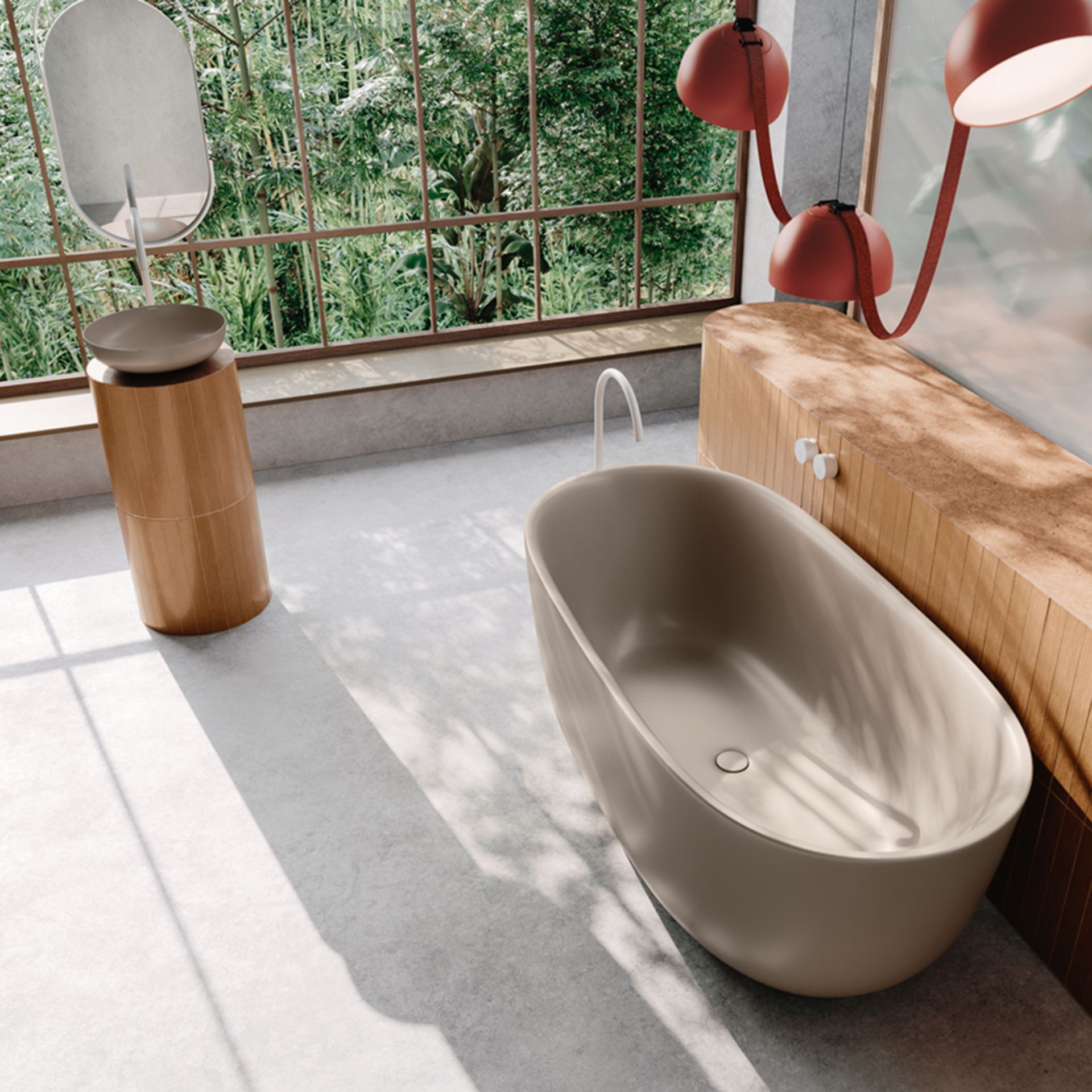 Light-filled bathroom with light floor and large freestanding grey bath