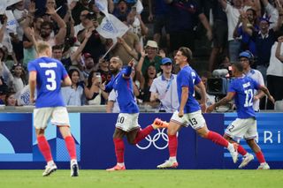 Alexandre Lacazette #10 of France celebrates scoring during the second half of the Men's group A match between France and United States during the Olympic Games Paris 2024 at Stade de Marseille on July 24, 2024 in Marseille, France. (Photo by Brad Smith/ISI/Getty Images)