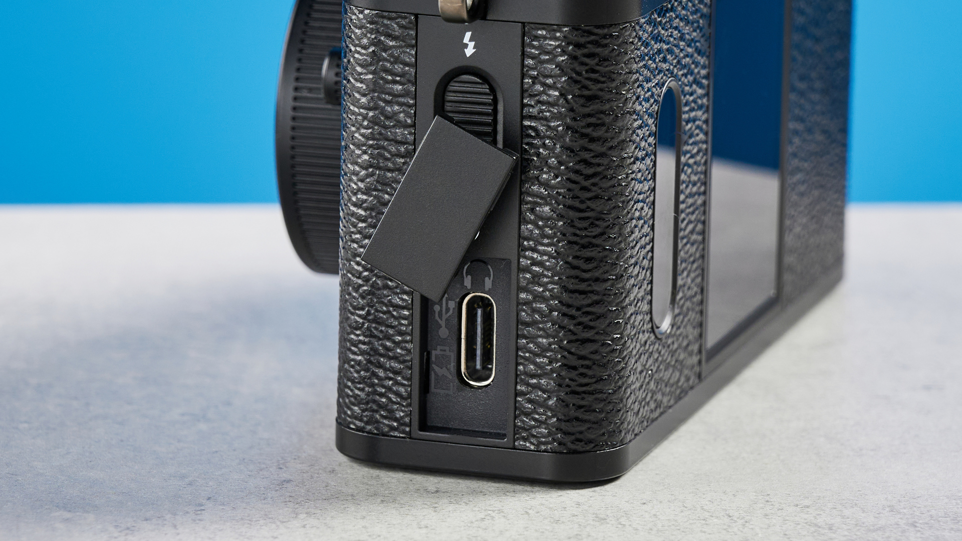 A black Fujifilm X half camera