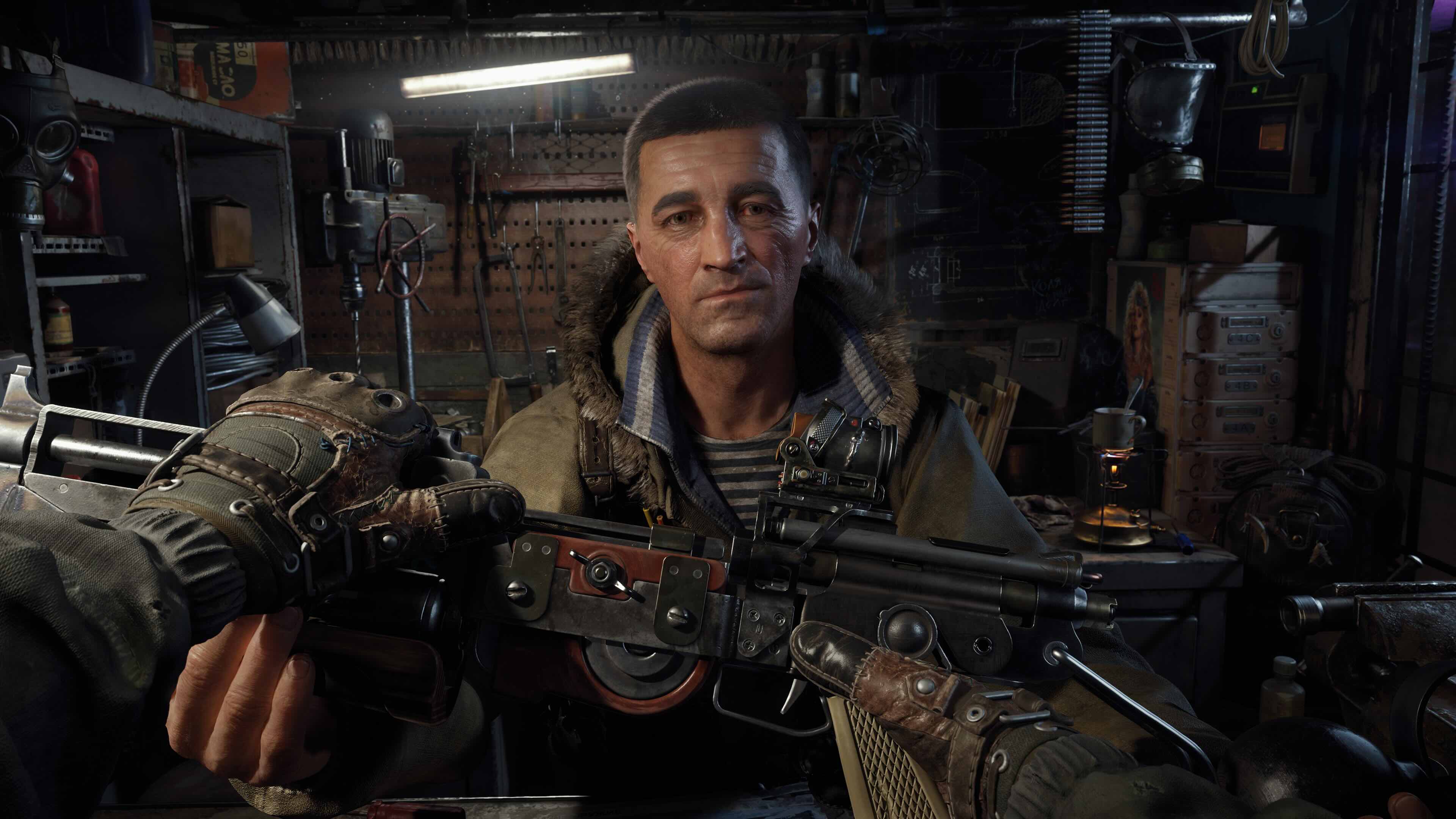 Armourer hands over a weapon.