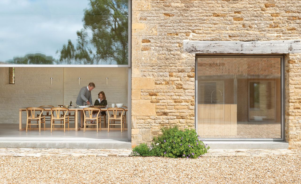 John and Catherine Pawson in Home Farm dining room 