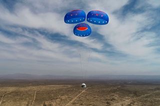 Blue Origin's New Shepard crew capsule descends to Earth under parachutes for a touchdown in West Texas.