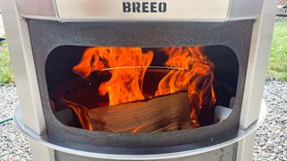Breeo Live-fire pizza oven bundle in back yard