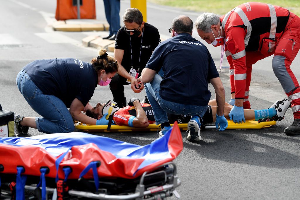 CATTOLICA ITALY MAY 12 Mikel Landa Meana of Spain and Team Bahrain Victorious are involved in an accident and is assisted by the medical team during the 104th Giro dItalia 2021 Stage 5 a 177km stage from Modena to Cattolica Crash Injury Abandon girodiitalia Giro on May 12 2021 in Cattolica Italy Photo by Tim de WaeleGetty Images