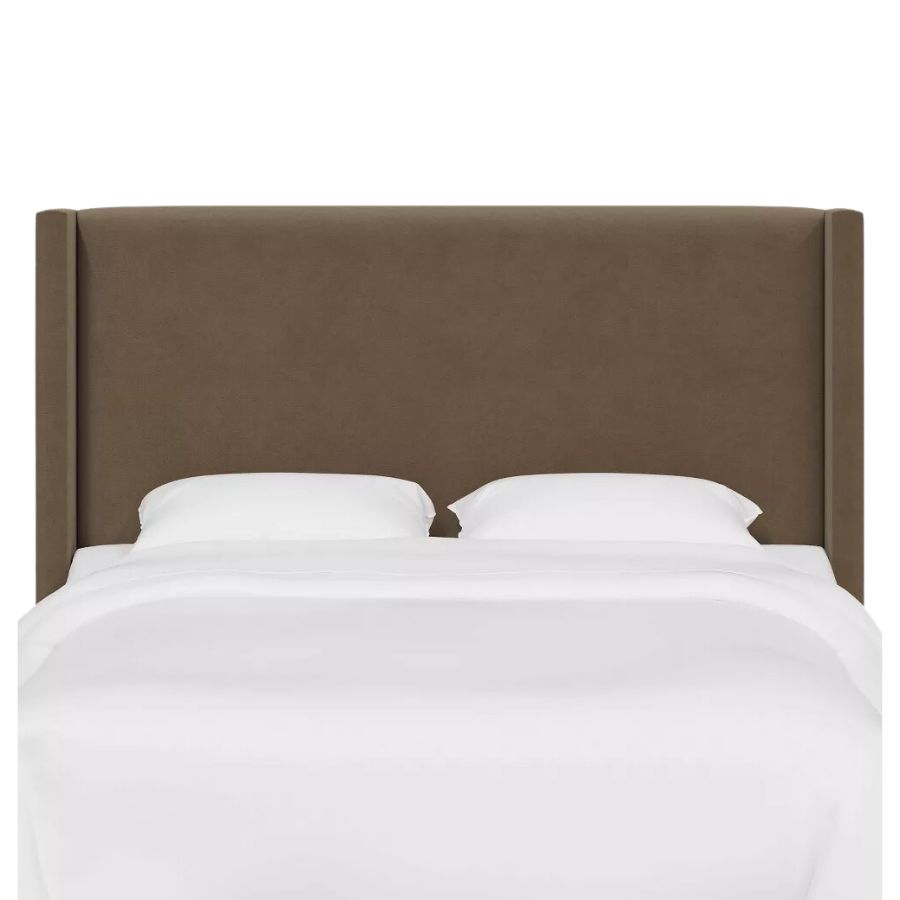 An upholstered bed headboard