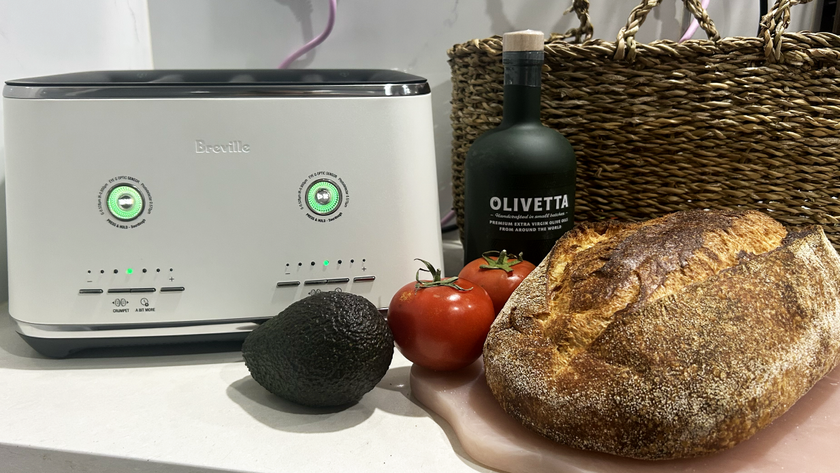 Breville Eye Q Auto toaster with sourdough loaf, tomato, olive oil and avocado in background