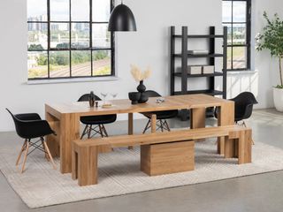 dining room with a large wood table and black chairs