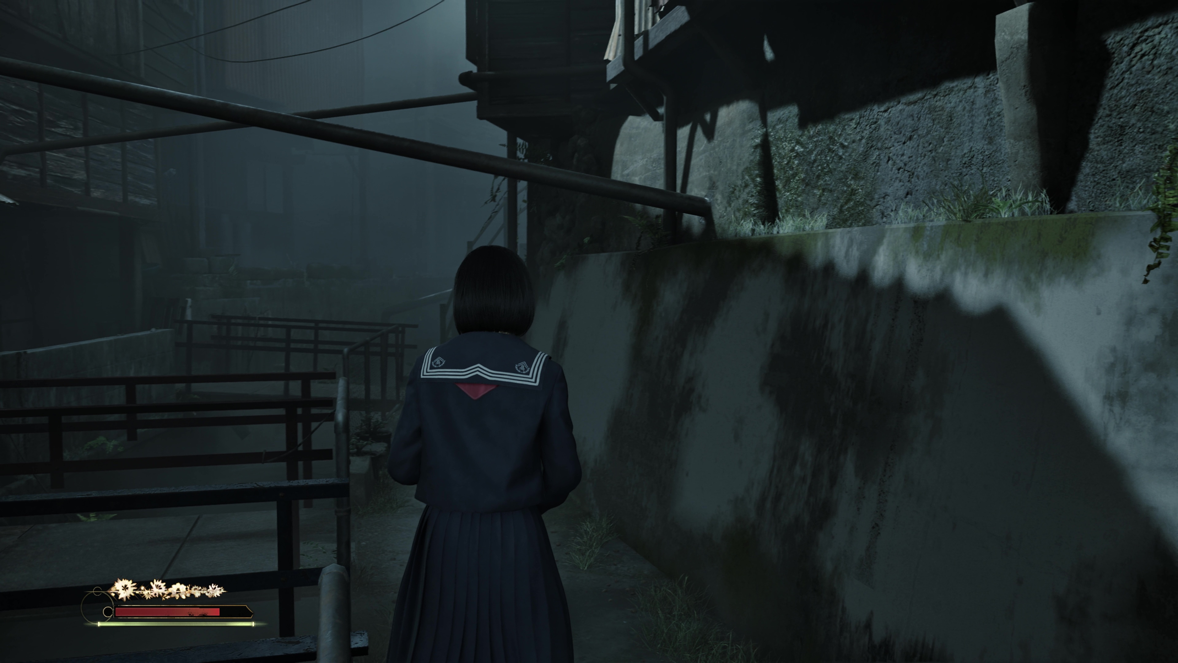 Hinako explores a river alley in Silent Hill f