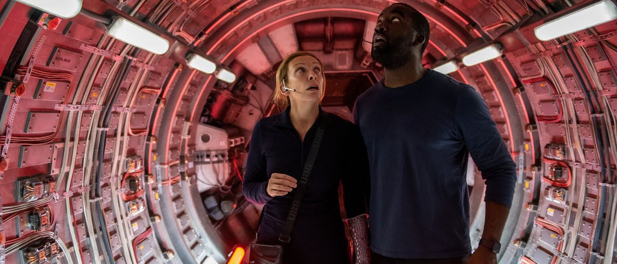 Toni Collete as Cmdr. Marina Barnett and Shamier Anderson as Michael Adams in &quot;Stowaway&quot; on Netflix.