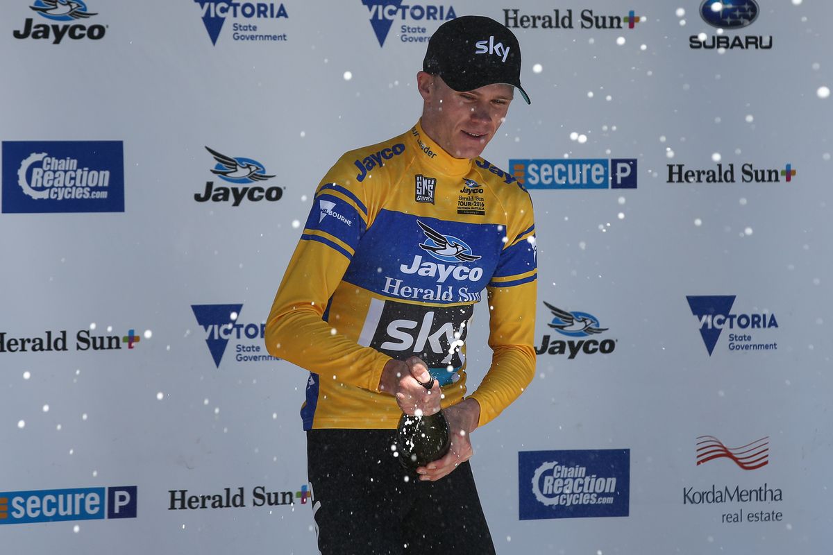 2016 winner Chris Froome opens the champagne bottle