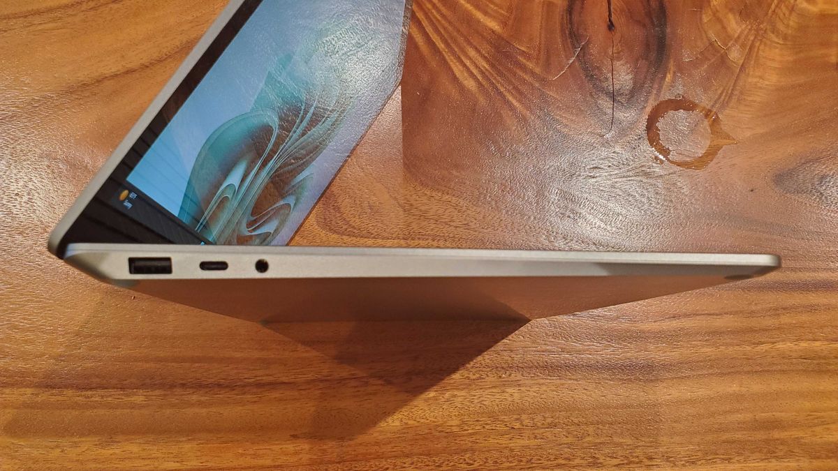 silver laptop sitting on its side