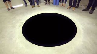 A black hole painted onto the floor