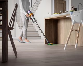 cordless vacuum cleaner used in kitchen