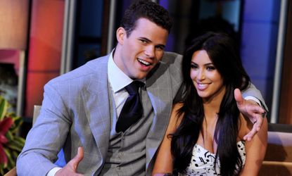 NBA player Kris Humphries (L) and his wife reality TV personality Kim Kardashian appear on the Tonight Show With Jay Leno