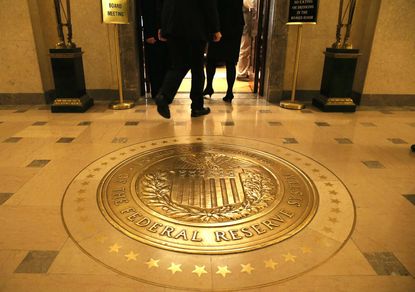 Federal Reserve ends quantitative easing program