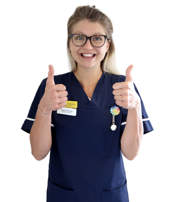 Midwife Pip Davies giving the thumbs up to camera