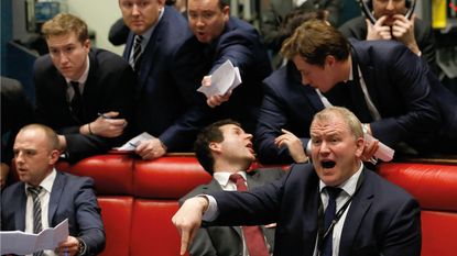 Traders at the London Metal Exchange