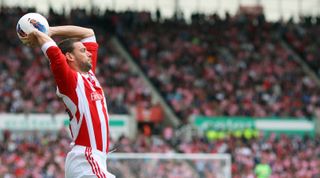 Rory Delap of Stoke City takes a throw in