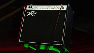 A Peavey Invective 112 combo amp 0n a stand