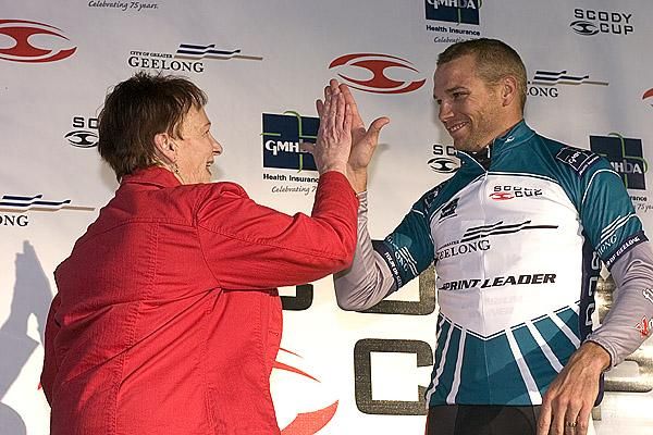 High-five: Fly V Australia's Jonathan Cantwell is congratulated by a tour sponsor on remaining in the City of Greater Geelong Sprint Points jersey.