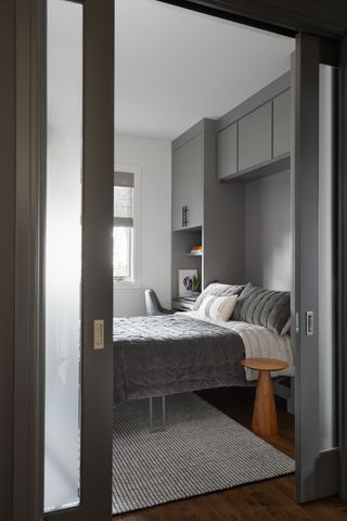 Small grey bedroom with murphy bed