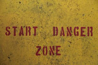 A sign that says "Start Danger Zone"